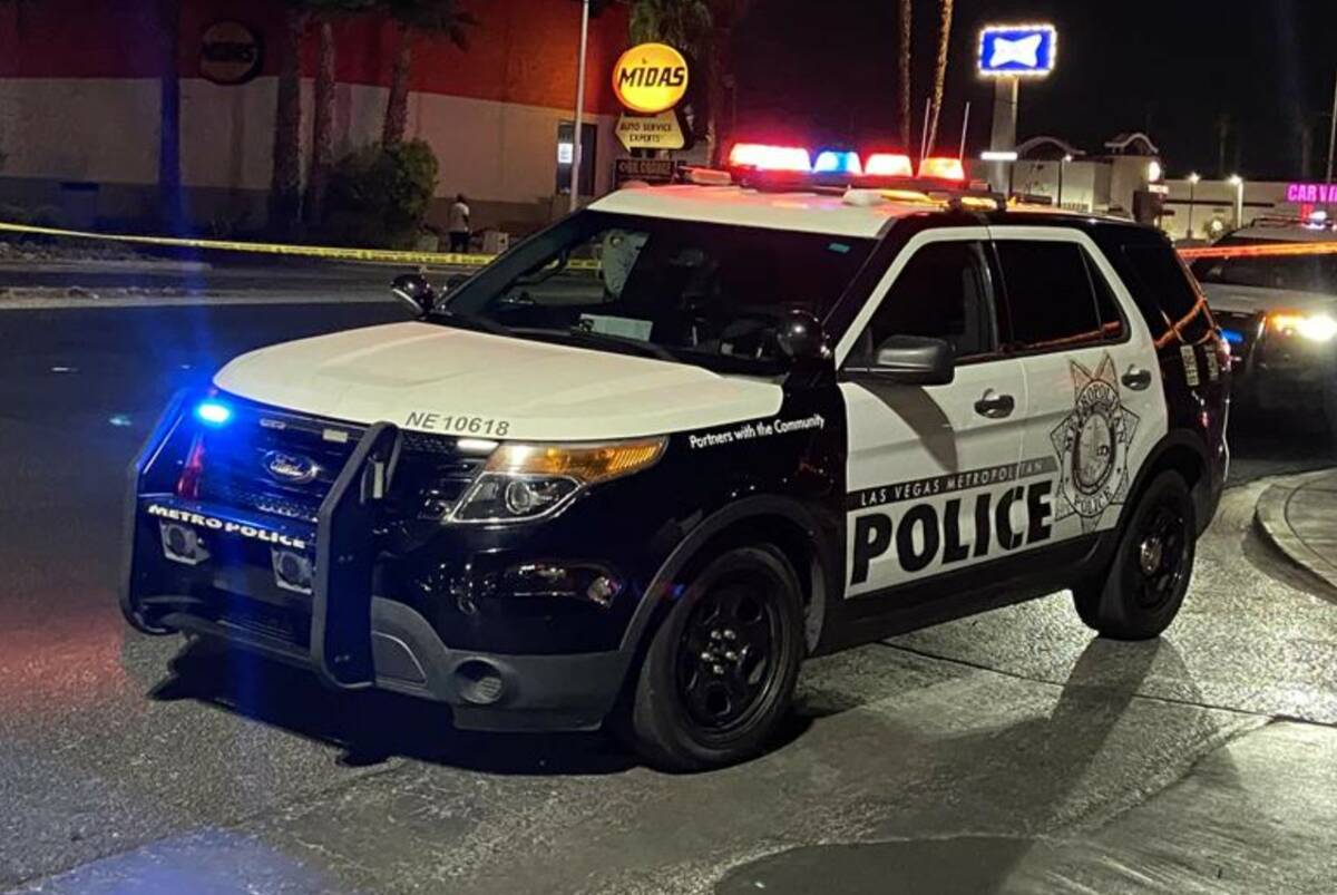 Police investigate the scene of a fatal crash on North Nellis Boulevard in Las Vegas on Sept. 4 ...