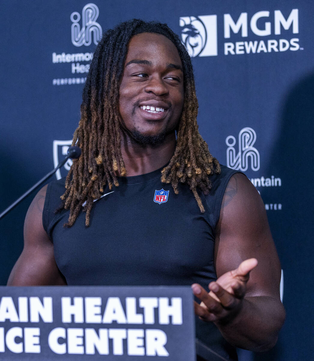 Raiders running back Ashton Jeanty (2) answers a question during a media interview at the Inter ...
