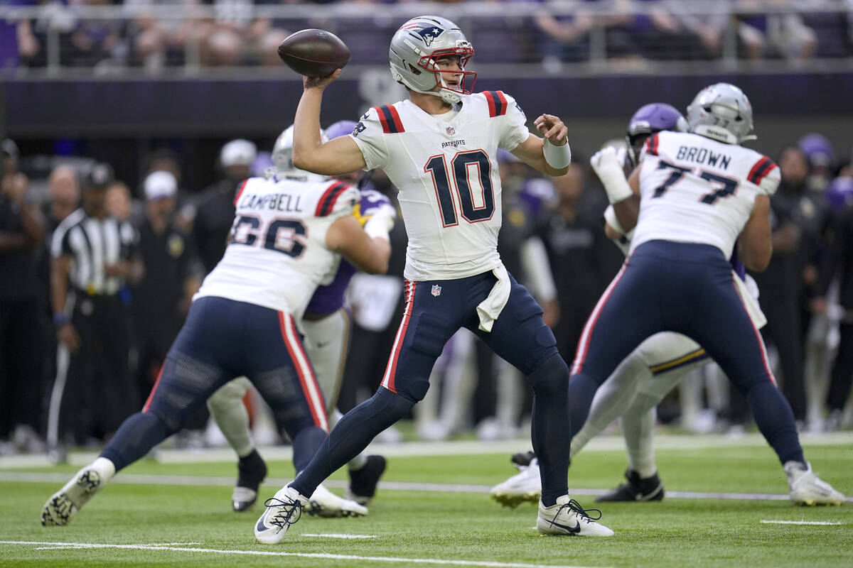New England Patriots quarterback Drake Maye throws during the first half of a preseason NFL foo ...