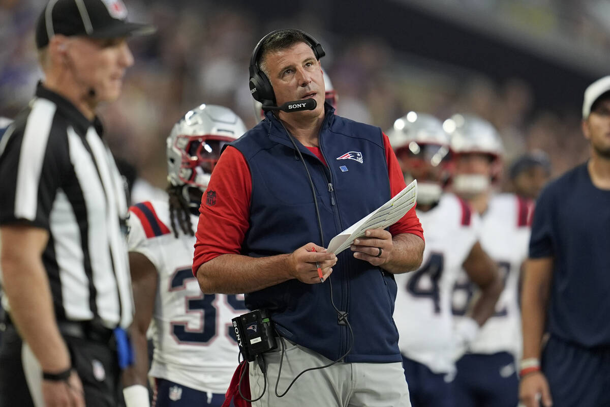 New England Patriots head coach Mike Vrabel watches from the sidelines during the first half of ...