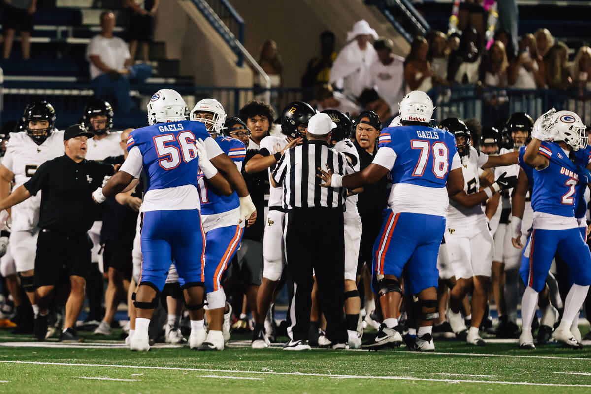 A fight breaks out during a high school football game between Lone Peak and Bishop Gorman at Bi ...