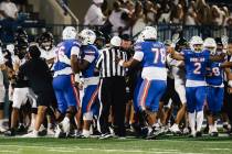 A fight breaks out during a high school football game between Lone Peak and Bishop Gorman at Bi ...