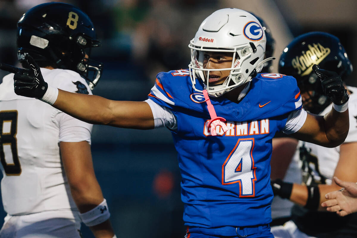 Bishop Gorman wide receiver Kaina Watson celebrates during a high school football game between ...