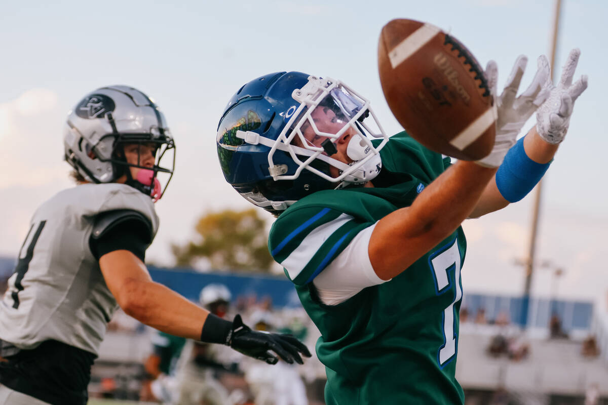 Green Valley wide receiver Sonny Uranich (7) just misses a pass intended for him during the foo ...