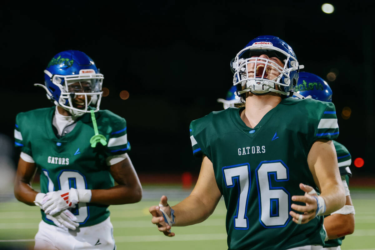 Green Valley’s Jonah Mancuso (76) yells in triumph after the Gators beat Palo Verde 21-1 ...
