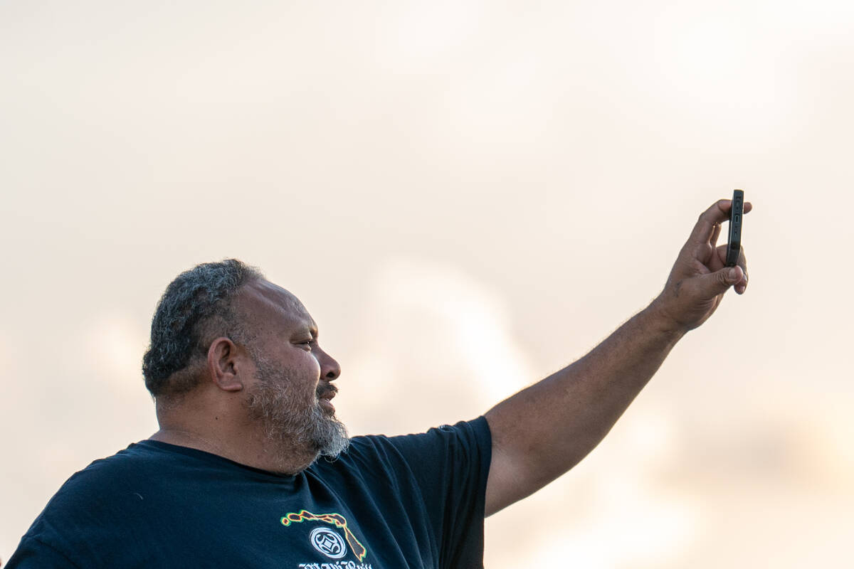 The crowd videotapes a football game between Losee and Sloan Canyon at Somerset Academy Losee C ...