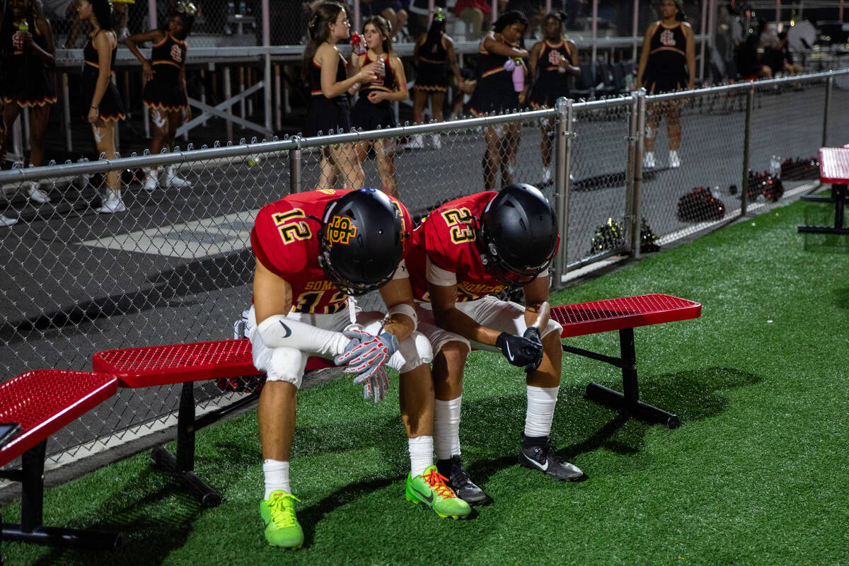 Losee’s Marcus Diaz and James Diaz-Guerrero catch their breath after a big play during a ...