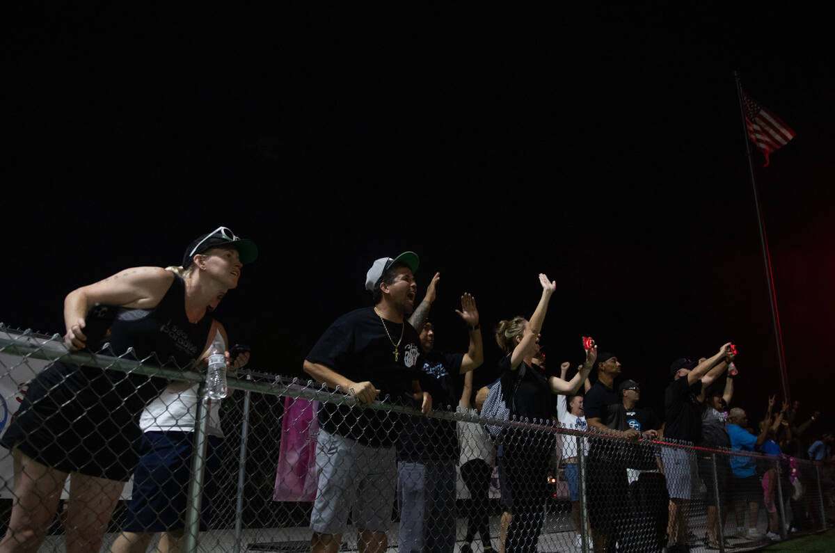 Sloan Canyon fans cheer as their team wins in overtime during a football game against Losee at ...