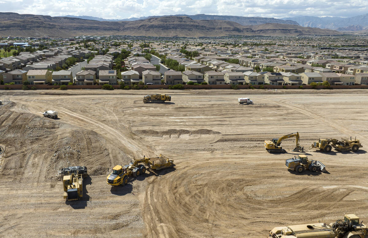 An aerial view of a construction site where developers broke ground on an apartment complex wes ...