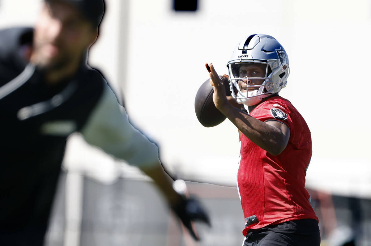 Raiders quarterback Geno Smith (7) throws a pass during practice at the Intermountain Health Pe ...