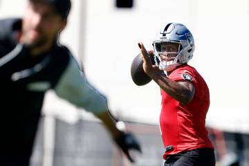 Raiders quarterback Geno Smith (7) throws a pass during practice at the Intermountain Health Pe ...