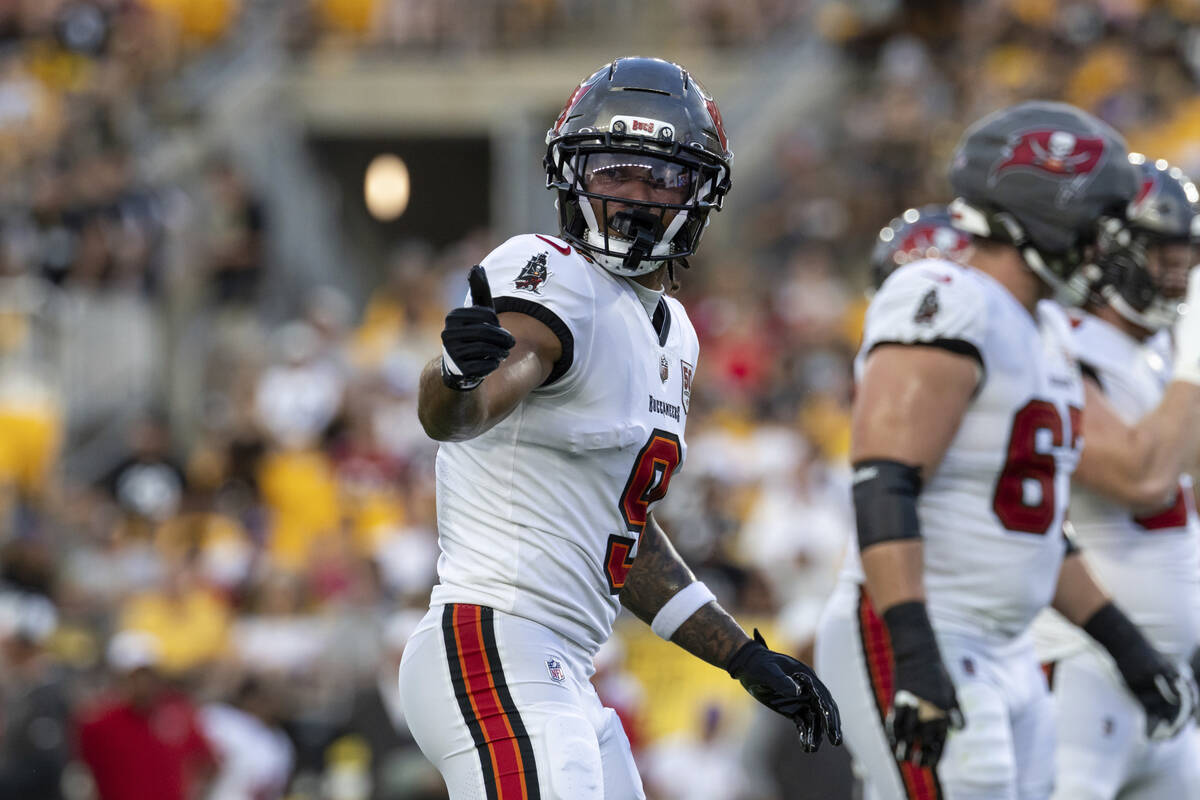 Tampa Bay Buccaneers wide receiver Emeka Egbuka (9) signals during a pre-season NFL football ga ...