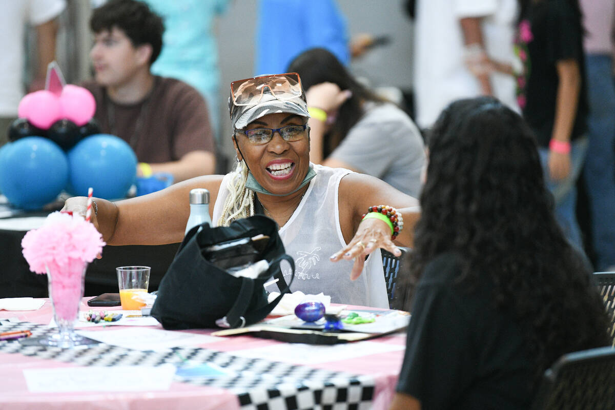 Patricia Charlotten talks with another attendee during an event to celebrate Grandparent&#x2019 ...