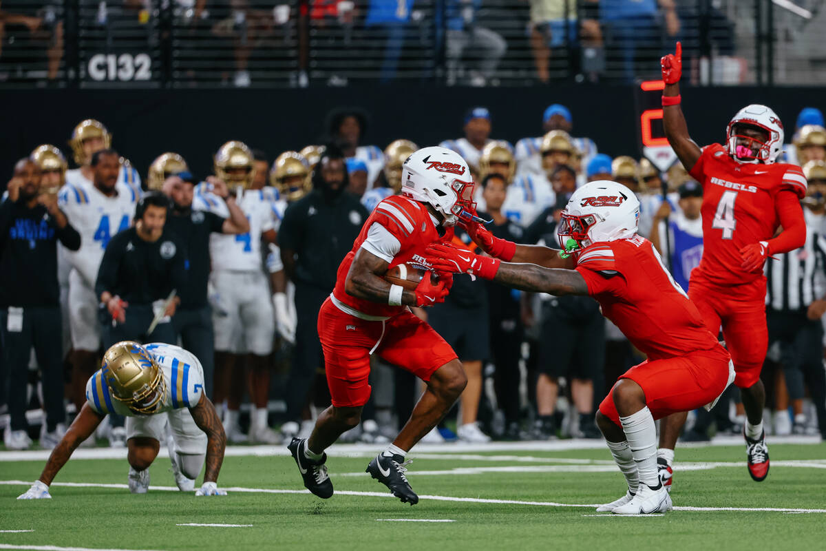 UNLV defensive back Aamaris Brown (9) intercepts a pass intended for UCLA wide receiver Mikey M ...