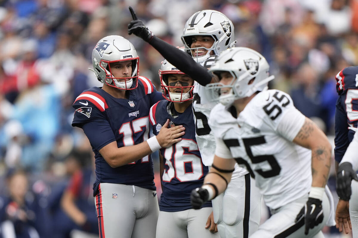 New England Patriots punter Bryce Baringer (17) consoles New England Patriots place kicker Andy ...
