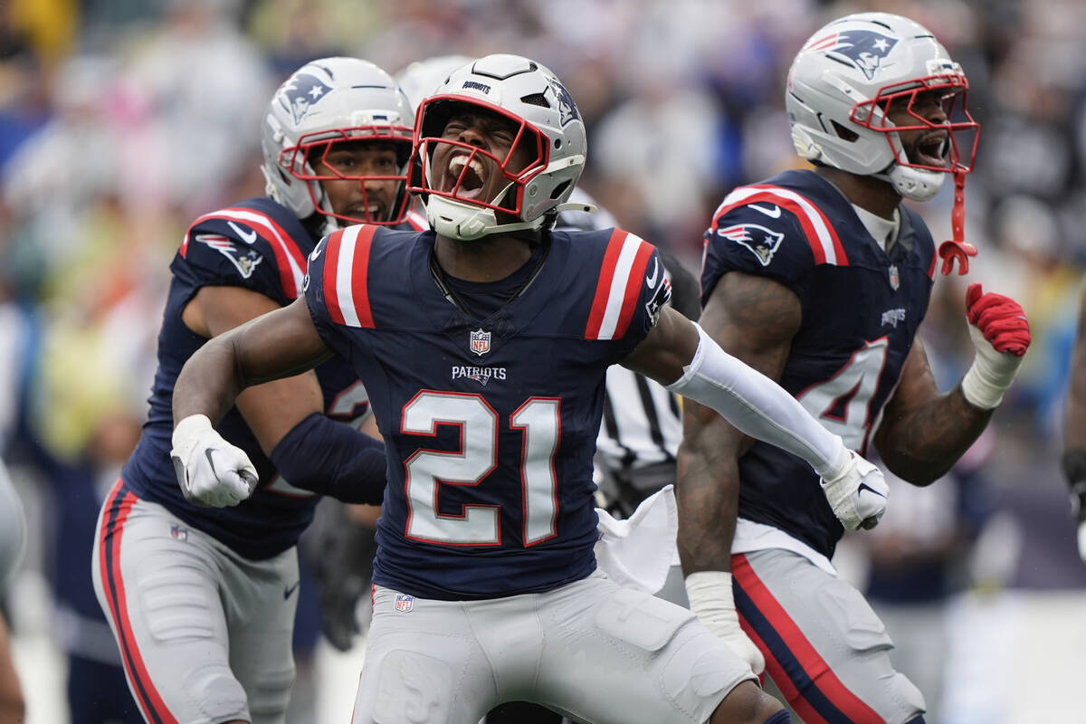 New England Patriots safety Jaylinn Hawkins (21) celebrates a sack against the Las Vegas Raider ...