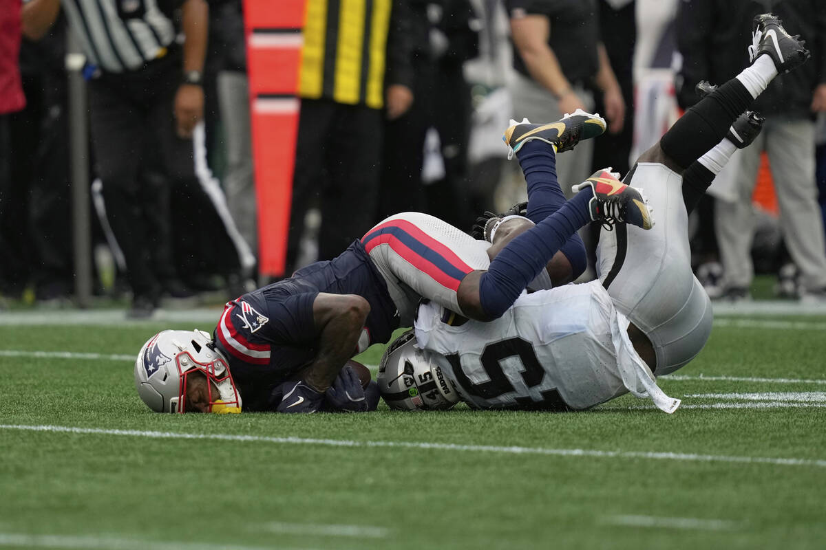 New England Patriots wide receiver Stefon Diggs (8) catches a pass against Las Vegas Raiders li ...