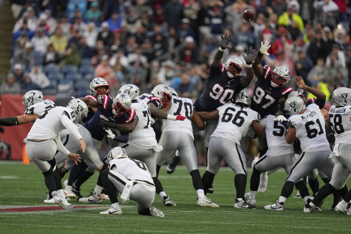 Las Vegas Raiders place kicker Daniel Carlson (8) misses a filed goal against the New England P ...
