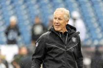 Raiders head coach Pete Carroll takes the field before a game against the New England Patriots ...