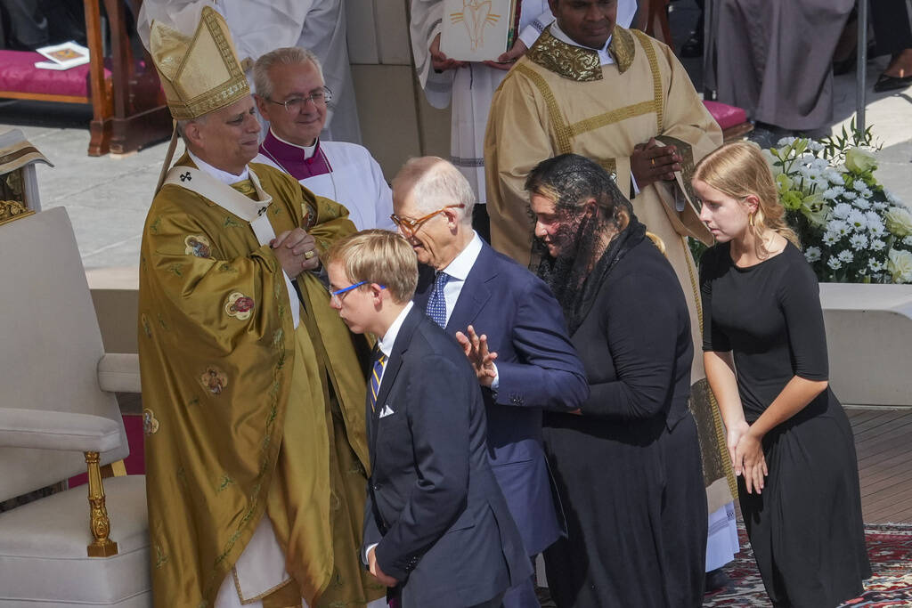 The family of Carlo Acutis, from right, sister Francesca, mother Antonia, father Andrea, and br ...