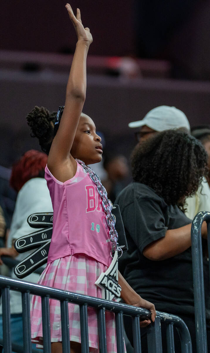 A girl tries to get the players attention after a game at T-Mobile Arena in Las Vegas Sept. 7, ...