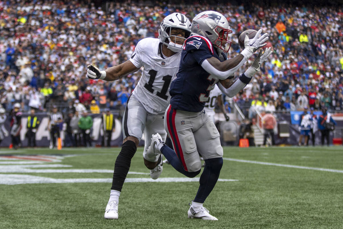 Raiders safety Jeremy Chinn (11) in coverage as New England Patriots wide receiver DeMario Doug ...