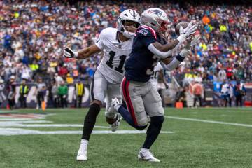 Raiders safety Jeremy Chinn (11) in coverage as New England Patriots wide receiver DeMario Doug ...