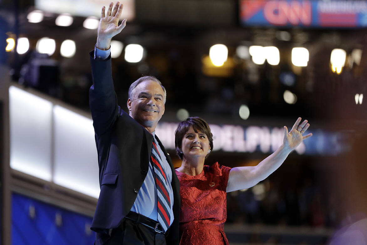Democratic vice presidential candidate, Sen. Tim Kaine, D-Va., waves with his wife Anne Holton ...