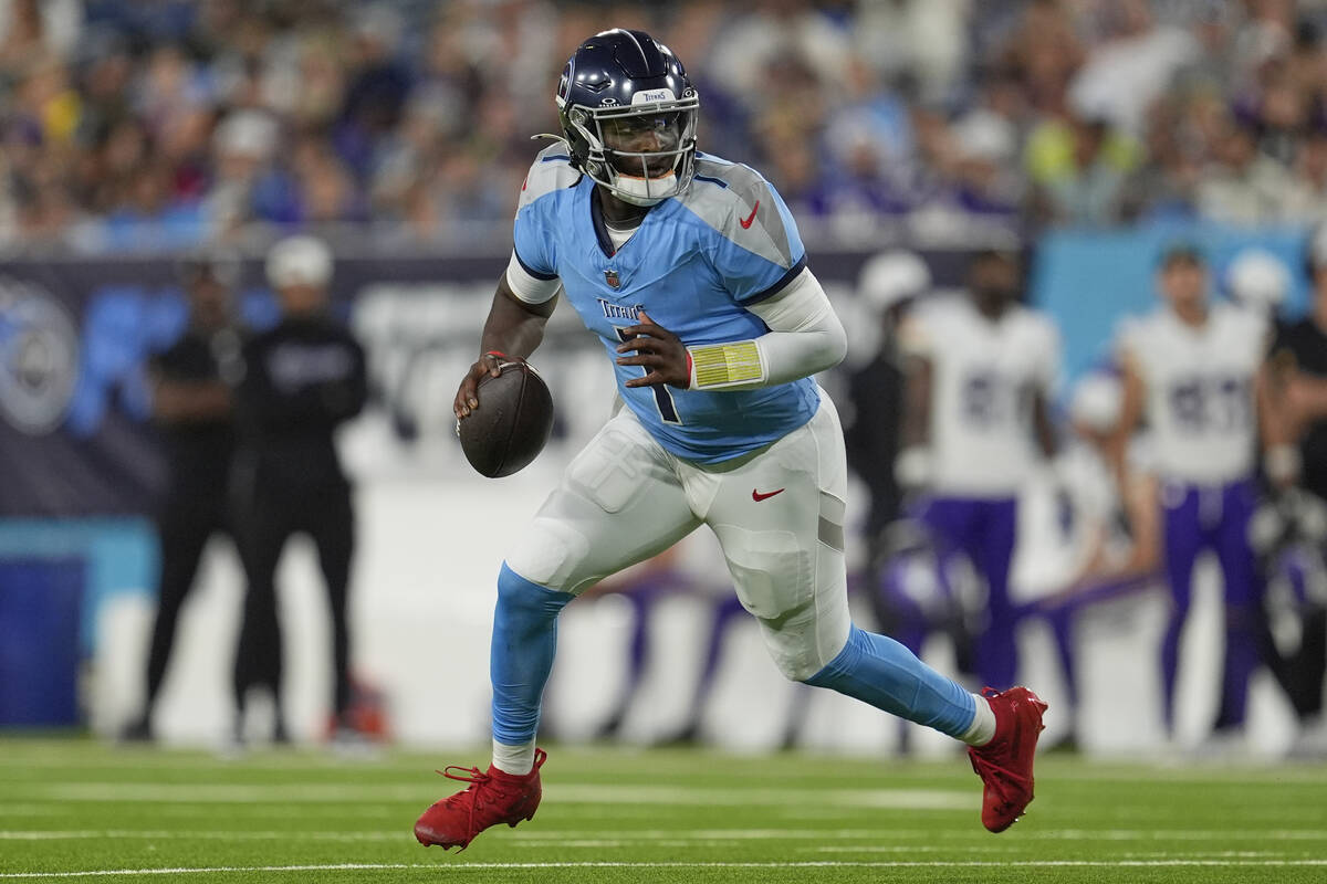 Tennessee Titans quarterback Cam Ward (1) plays during the first half of a preseason NFL footba ...