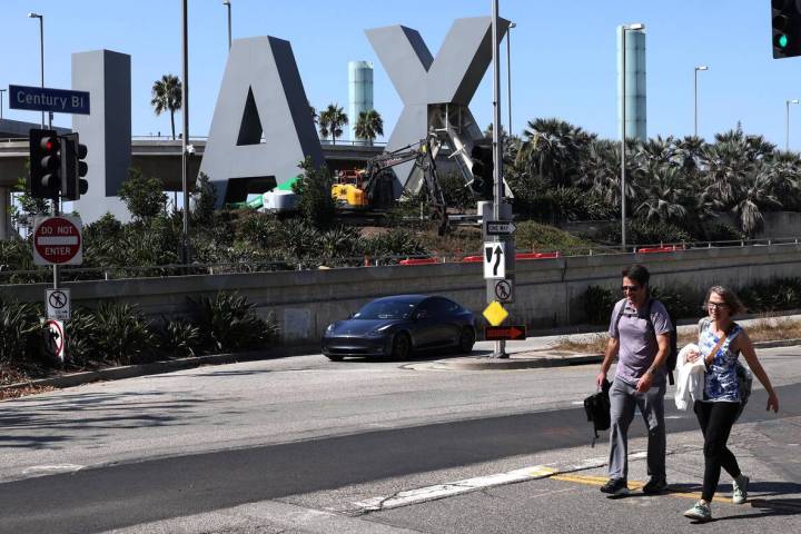 Starting with the letter "X" work has begun on removing the iconic LAX sign to make w ...