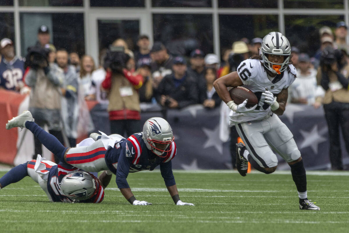 Raiders wide receiver Jakobi Meyers (16) takes off after making a catch as New England Patriots ...