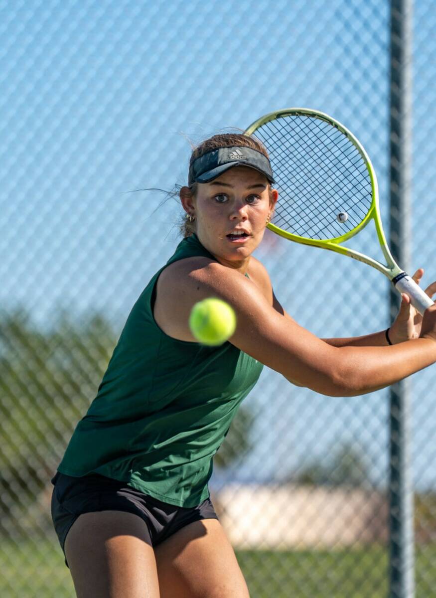 Palo Verde’s Remi Rice returns the ball during a high school tennis match against Coronado in ...