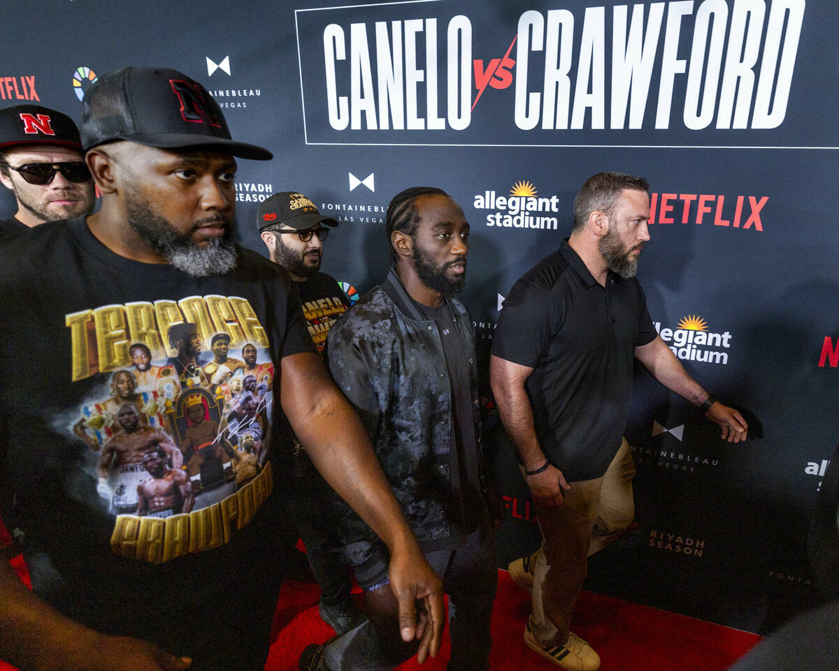Terence Crawford walks a red carpet during boxing arrivals at the Fontainebleau on Tuesday, Sep ...
