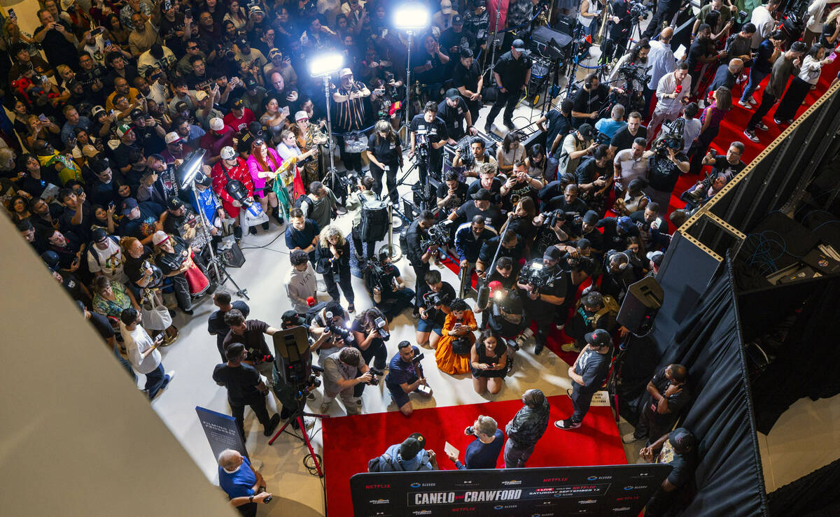 Terence Crawford answers questions before the media and fans on a red carpet during boxing arri ...