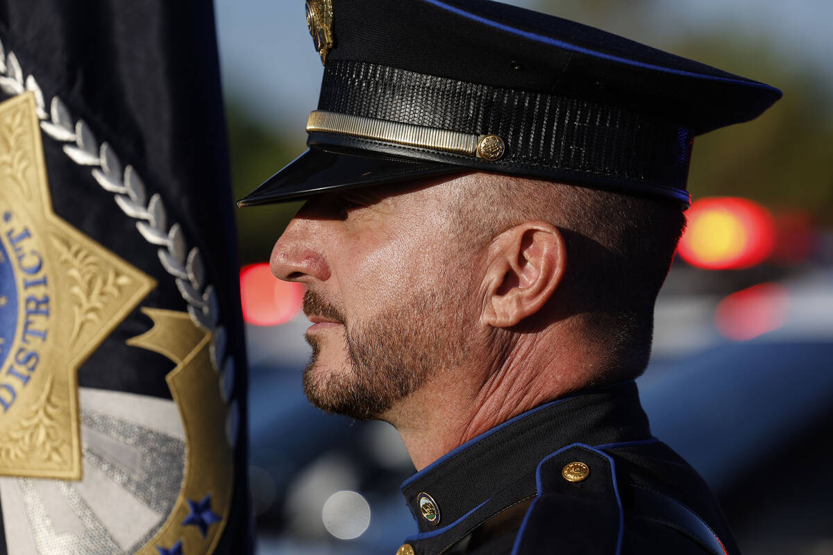 CCSD Police Officer Anthony Gaspardi listens to a speaker during Palo Verde's annual 9/11 ...