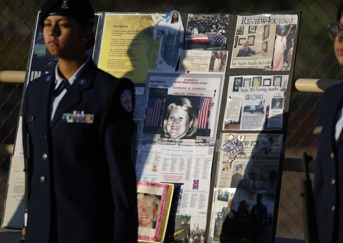 Members of the Air Force ROTC stand guard by a memorial for former foreign languages teacher Ba ...