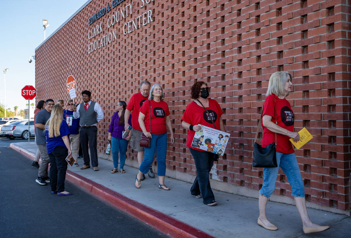 Protesters file into the Edward A. Greer Education Center to speak during Thursday’s Clark Co ...