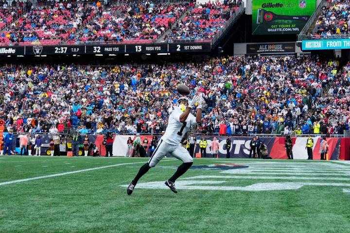 Las Vegas Raiders wide receiver Tre Tucker (1) catches a pass for a touchdown against the New E ...