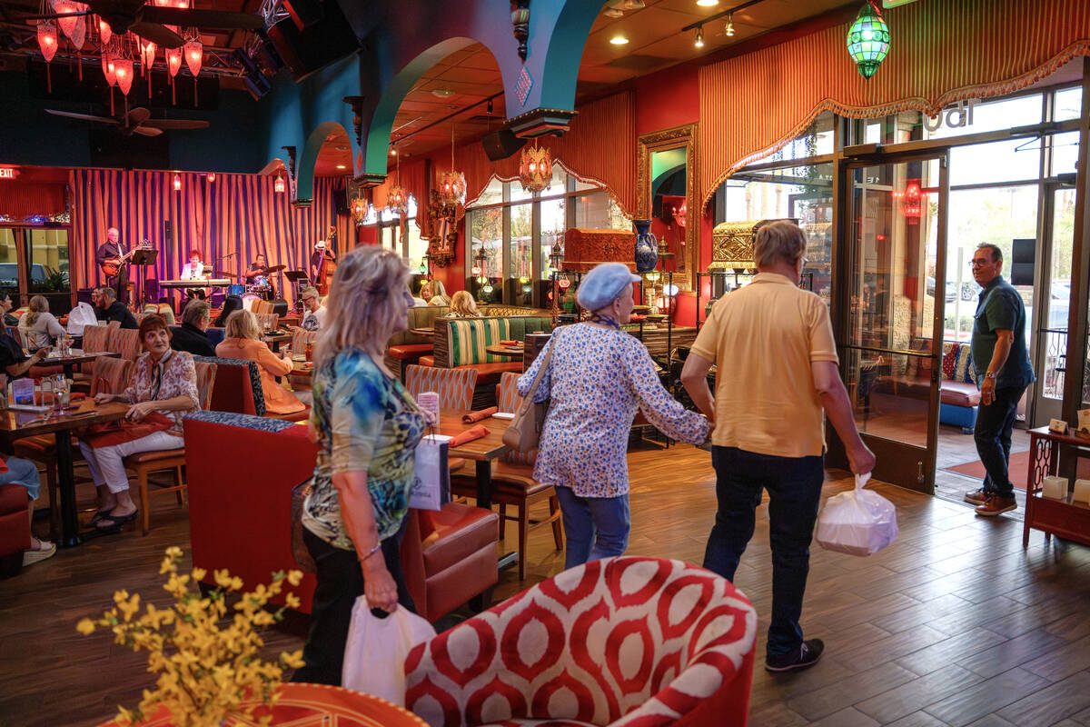 Owner Paymon Raouf thanks guests as they exit after dinner at Paymon’s Fresh Kitchen and ...