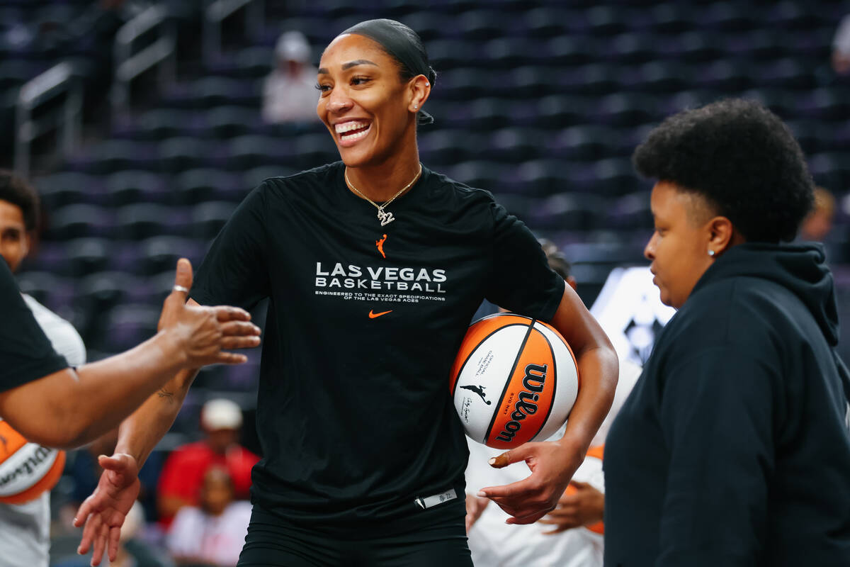 Aces center A'ja Wilson (22) grins as she warms up before the Aces’ last home game ...