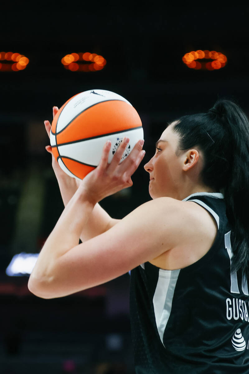 Aces center Megan Gustafson (17) takes a three-pointer during the second half of the Aces&#x201 ...