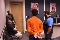 The teen offender paroled for the death of Keanu Enright leaves the courtroom at the conclusion ...