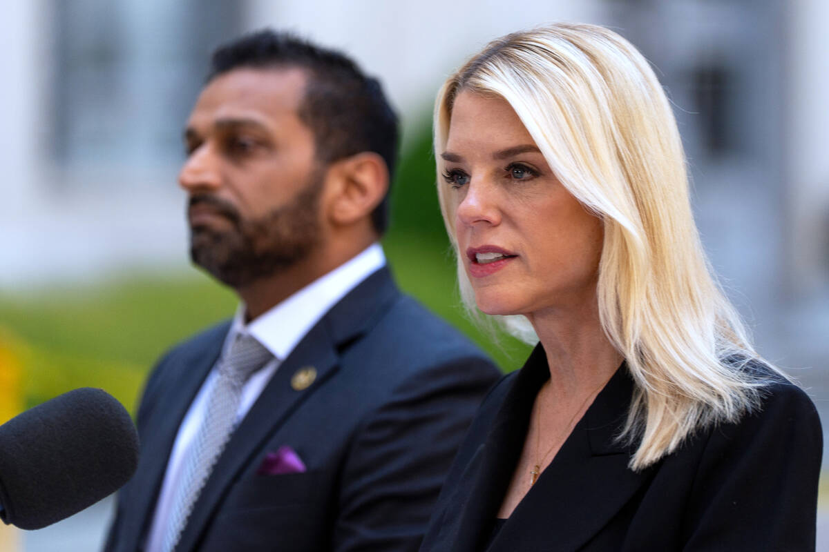 FILE - Attorney General Pam Bondi and FBI Director Kash Patel speak during a news conference at ...