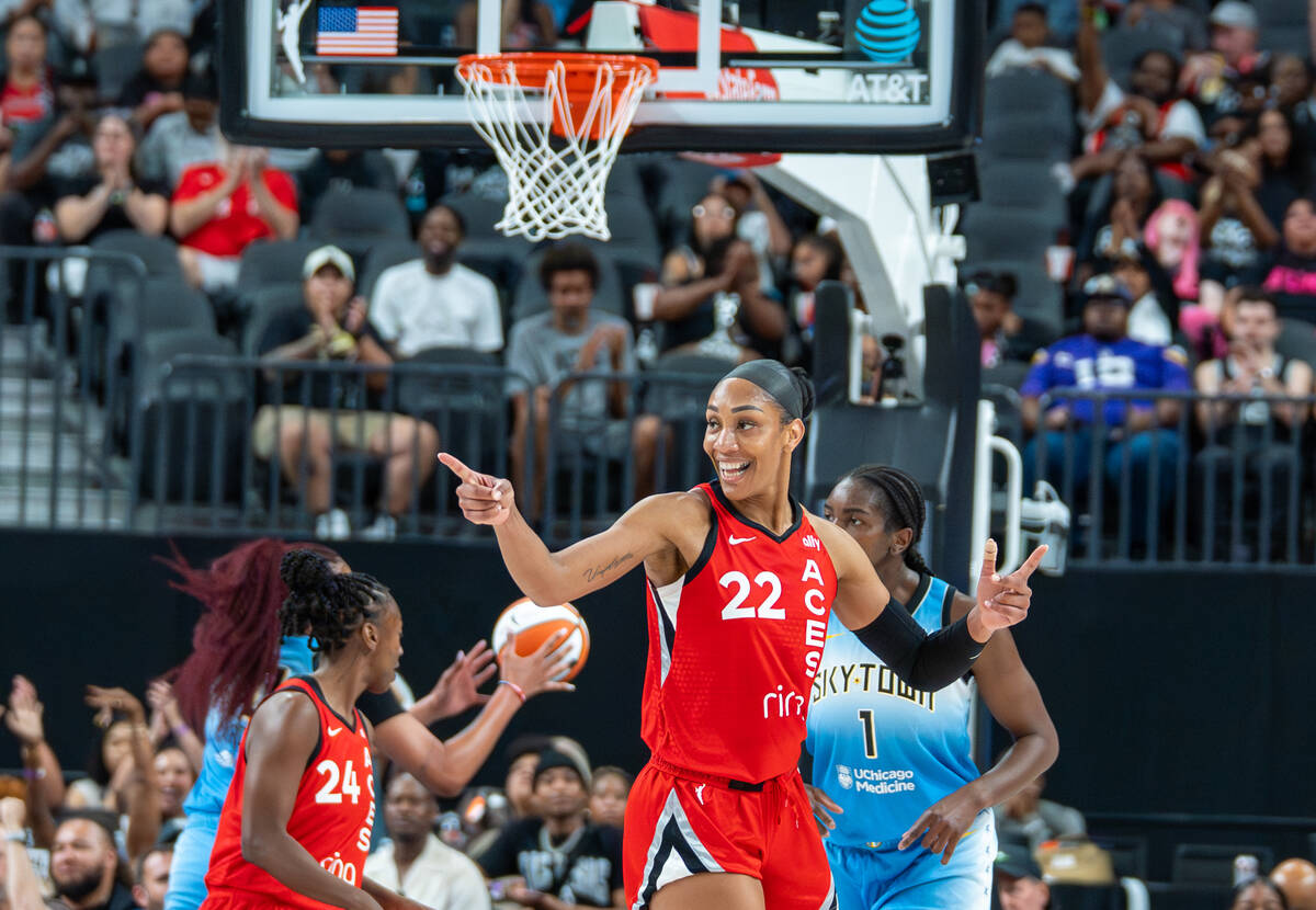 Aces’s Center A'ja Wilson (22) celebrates after a basket during a basketball game b ...
