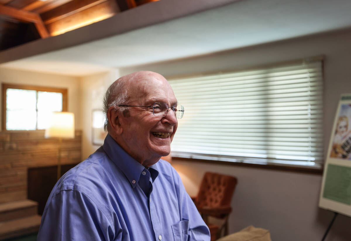 Historian and preservationist Mel Green speaks with guests during a tour of the Howard Hughes & ...