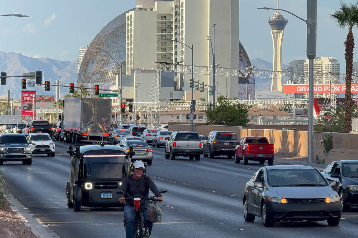 A Zoox robotaxi travels on Koval Lane toward Topgolf on Friday, Sept. 5, 2025. (Mick Akers/Las ...
