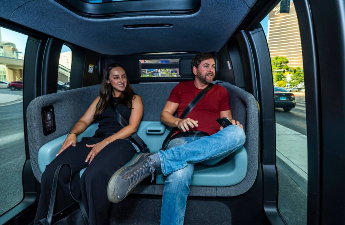Zoox Co-Founder & CTO Jesse Levinson, right, and Public Relations Manager Marisa Wiggam take a ...