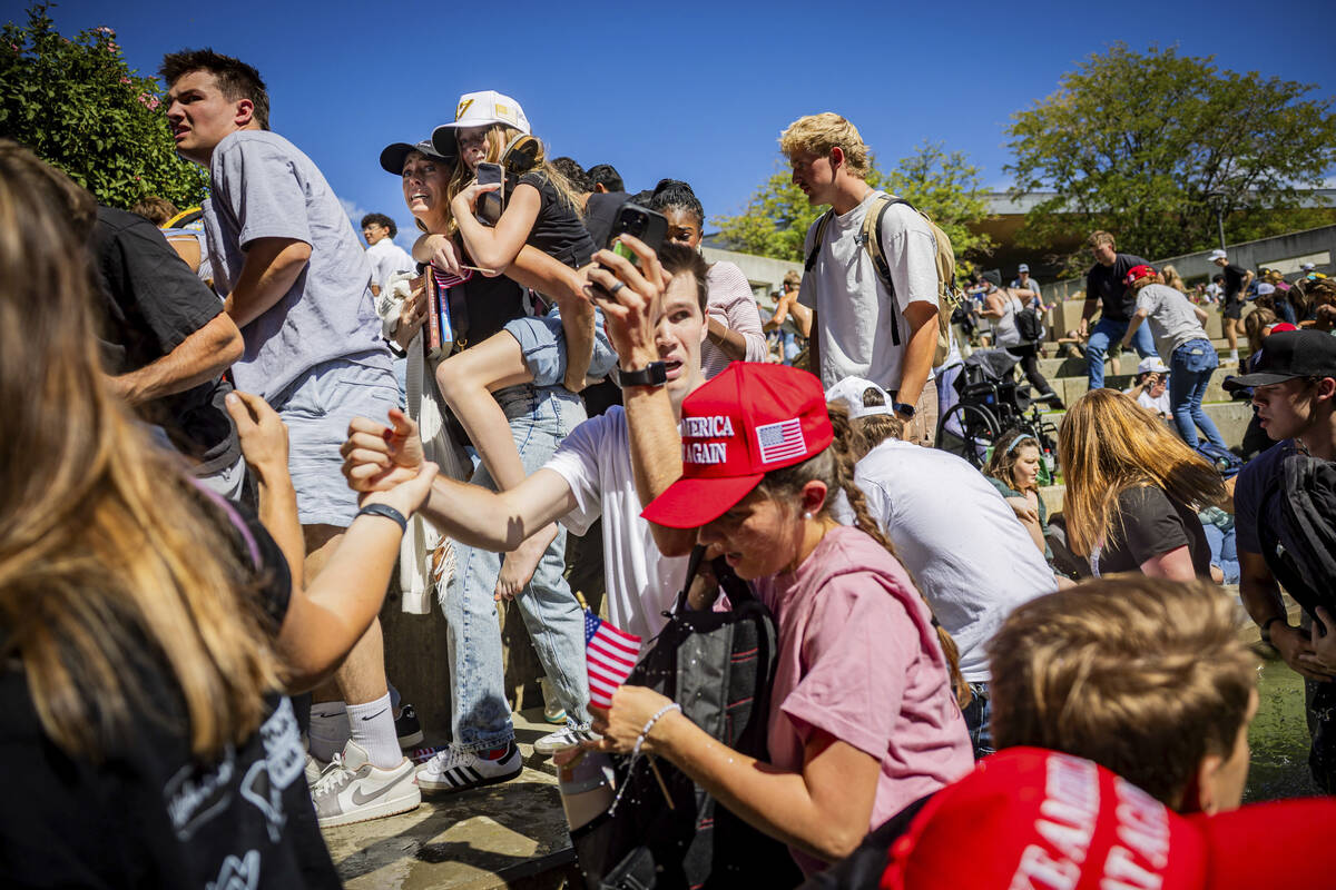 The crowd reacts after Charlie Kirk, the CEO and co-founder of the conservative youth organizat ...
