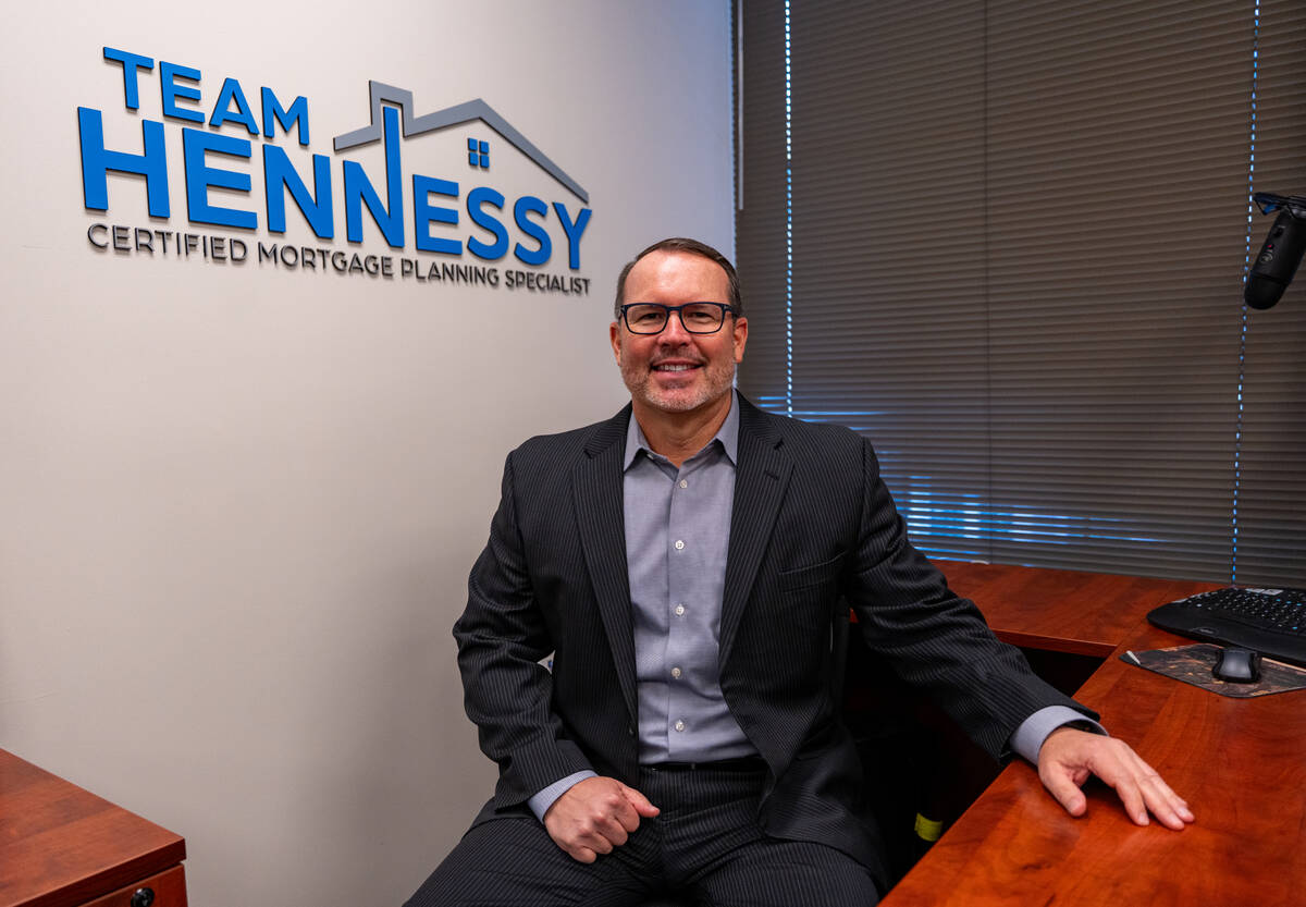 Mortgage adviser Matt Hennessy sits for a portrait in his office in Las Vegas Sept. 12, 2025. ( ...