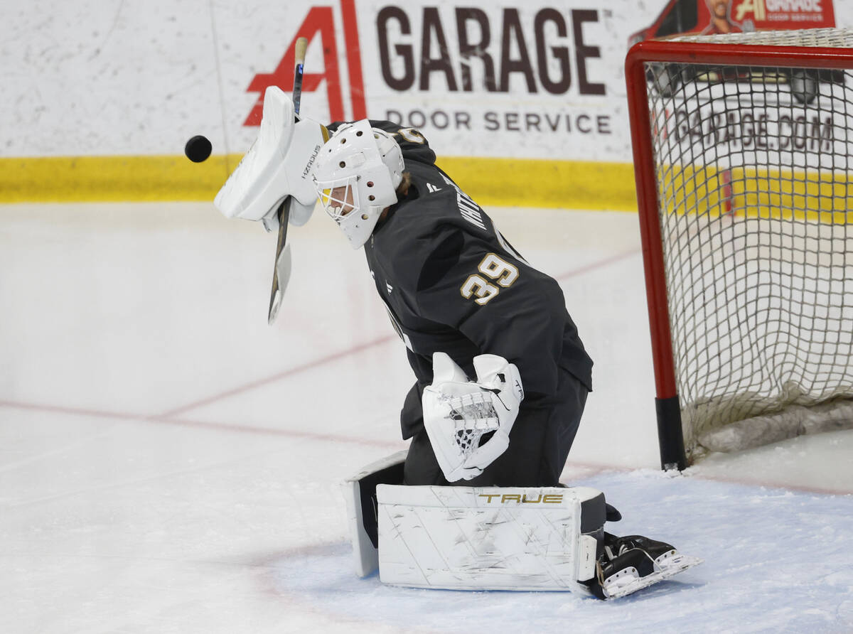 Golden Knights goaltender Cameron Whitehead (39) makes a save during rookie camp at City Nation ...